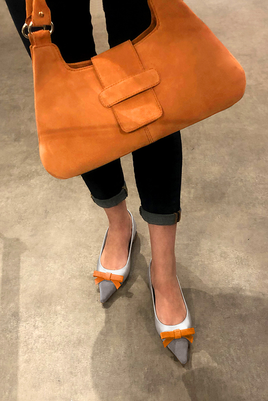 Apricot orange women's dress handbag, matching pumps and belts. Worn view - Florence KOOIJMAN